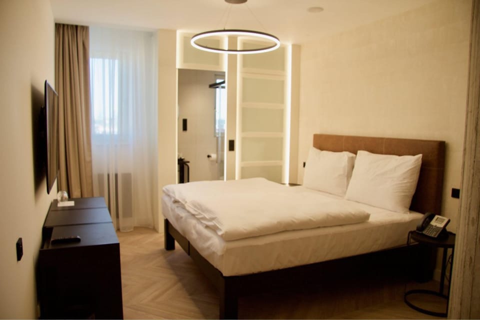 Premium bedding, memory foam beds, in-room safe, desk