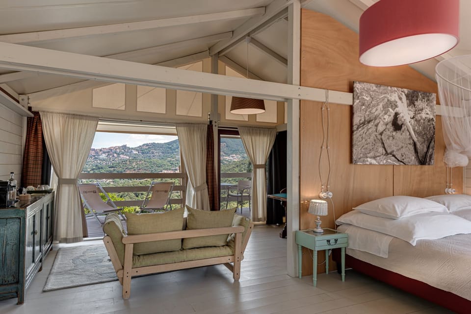 Deluxe Tent, Terrace, Hill View | Living area | 55-inch flat-screen TV with digital channels