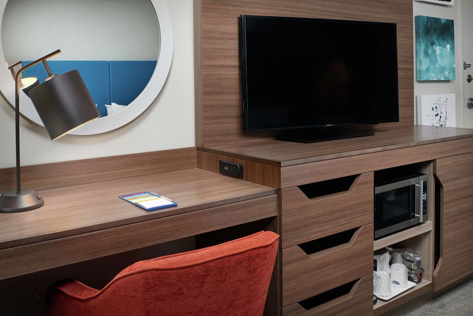 Desk, blackout drapes, soundproofing, iron/ironing board