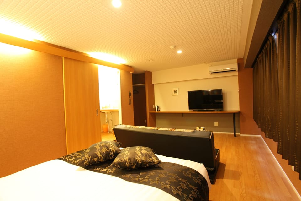 Double Room, Smoking | Down comforters, individually decorated, desk, laptop workspace