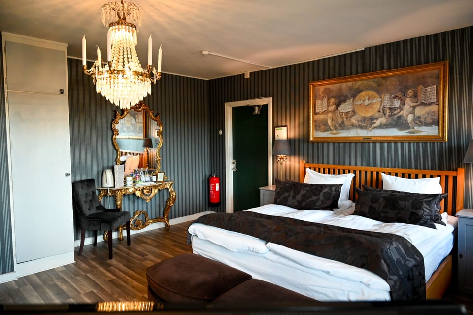 Family Room, Multiple Beds, Balcony, Courtyard Area | Premium bedding, minibar, individually decorated, individually furnished