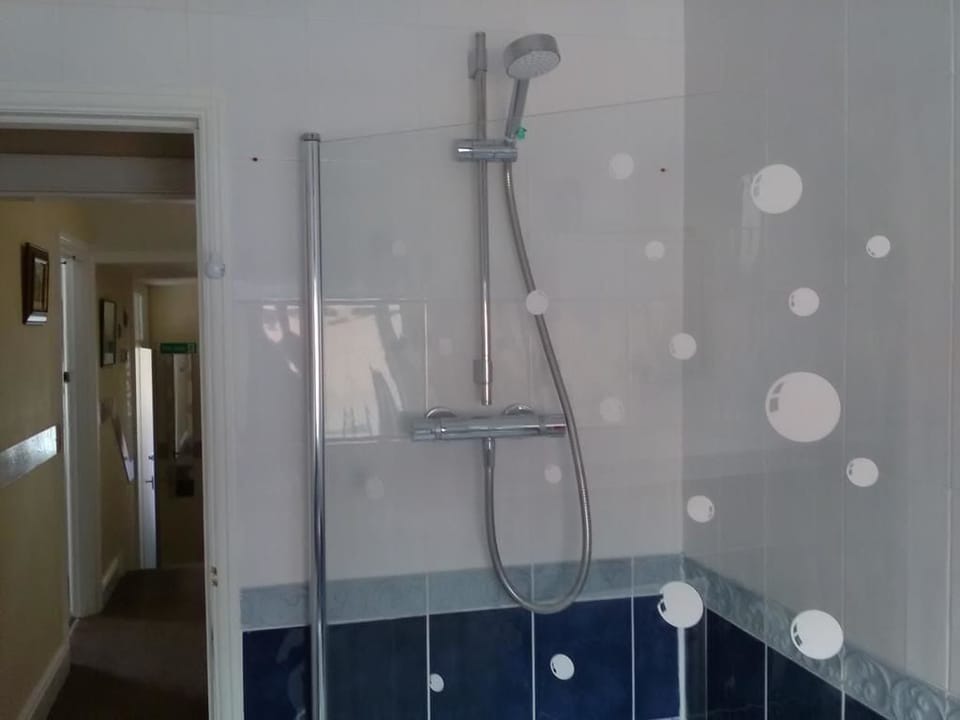 Combined shower/tub, free toiletries, hair dryer, bathrobes