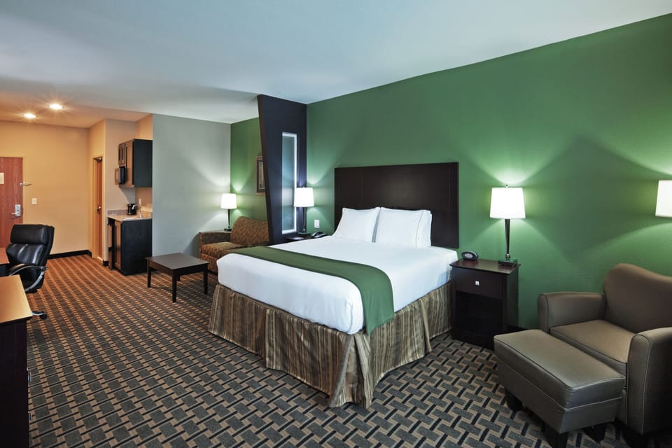 Down comforters, pillowtop beds, in-room safe, desk