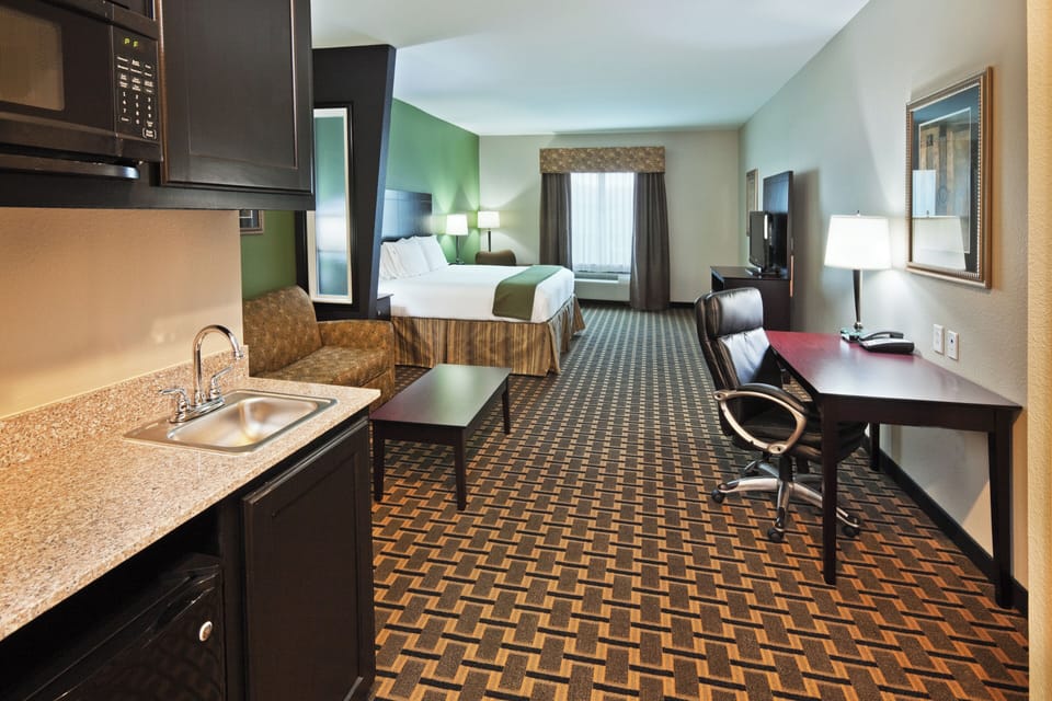 Down comforters, pillowtop beds, in-room safe, desk