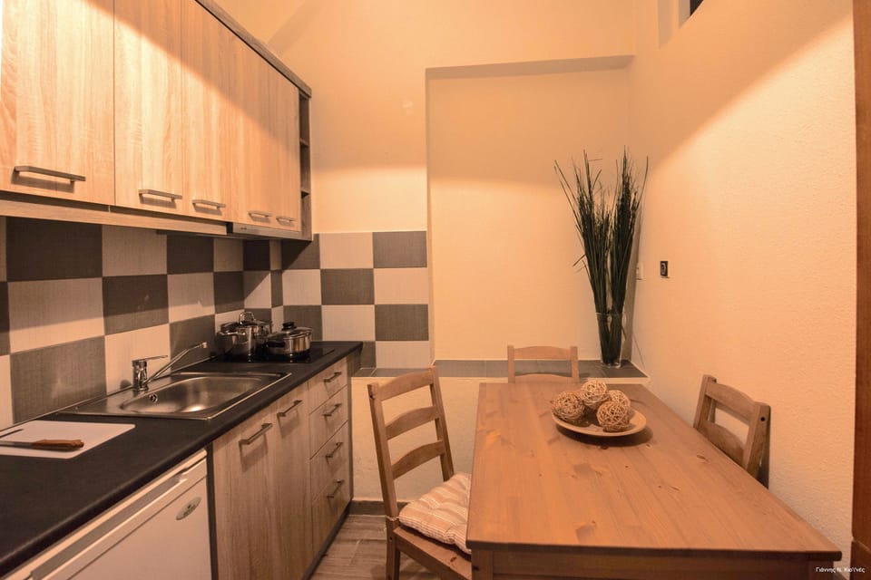 Apartment, Ground Floor | Private kitchen | Fridge, stovetop, cookware/dishes/utensils