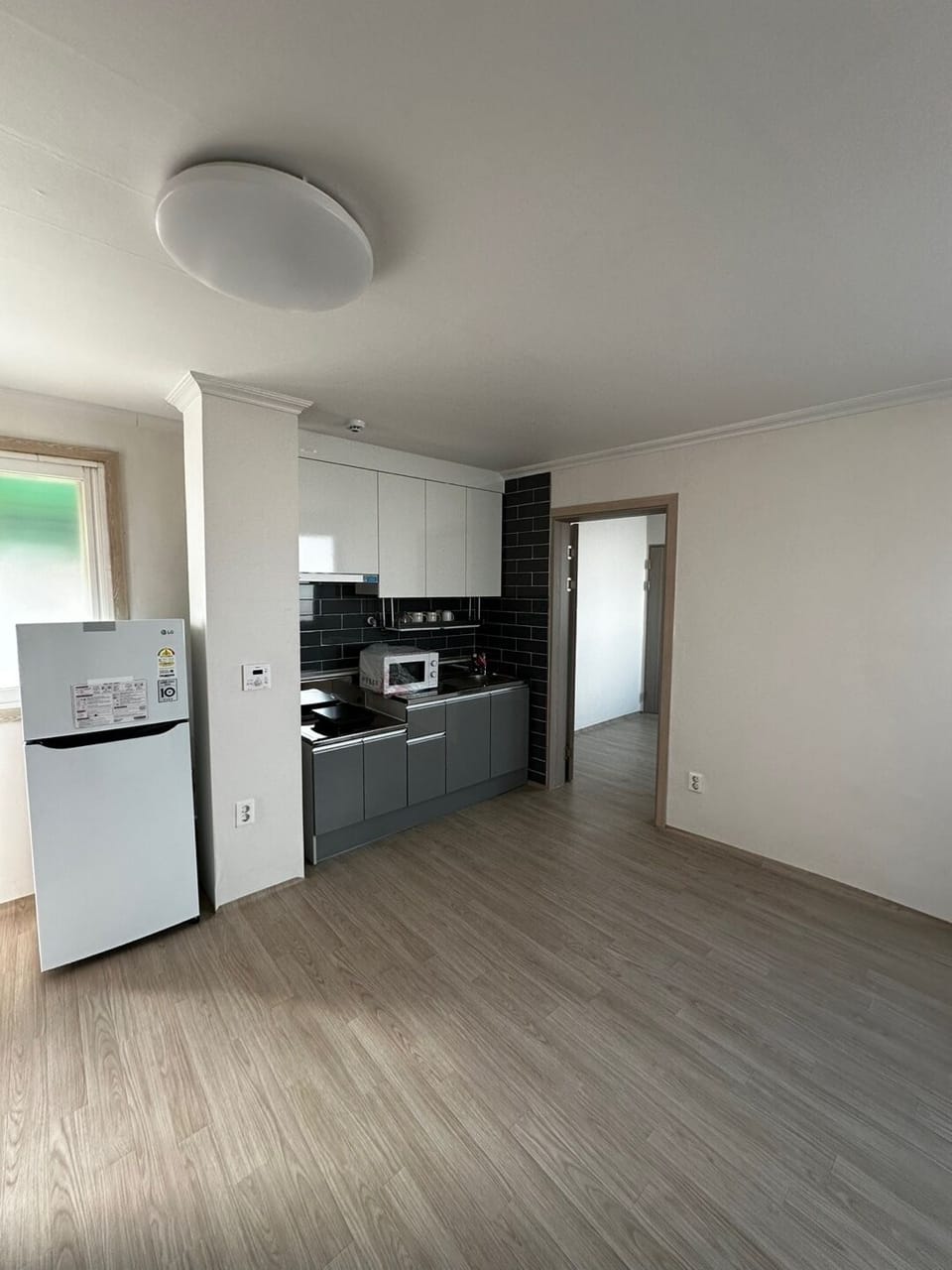 Villa | Private kitchen | Fridge, microwave, cookware/dishes/utensils