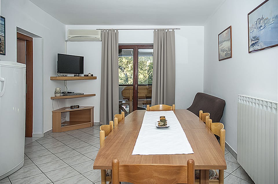 Apartment, 2 Bedrooms (8 Adults) | Living area | 85-cm LED TV with satellite channels, TV