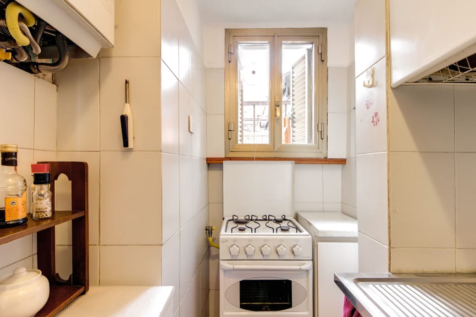 Full-size fridge, oven, stovetop, espresso maker