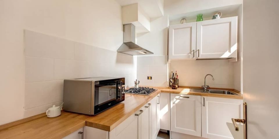 Apartment, 2 Bedrooms | Private kitchenette | Fridge, microwave, stovetop, dishwasher