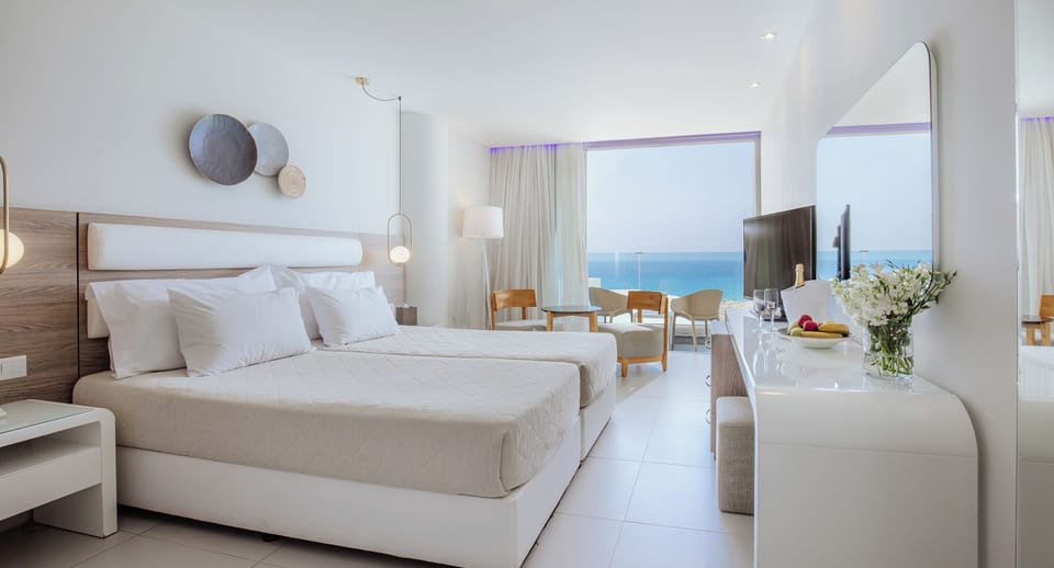 Penthouse, Sea View | In-room safe, desk, laptop workspace, blackout drapes