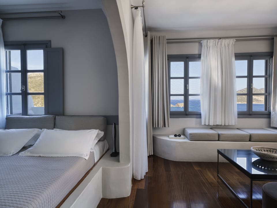 Upper-Level Suite with Sea View for 2 | Minibar, in-room safe, individually decorated, free WiFi
