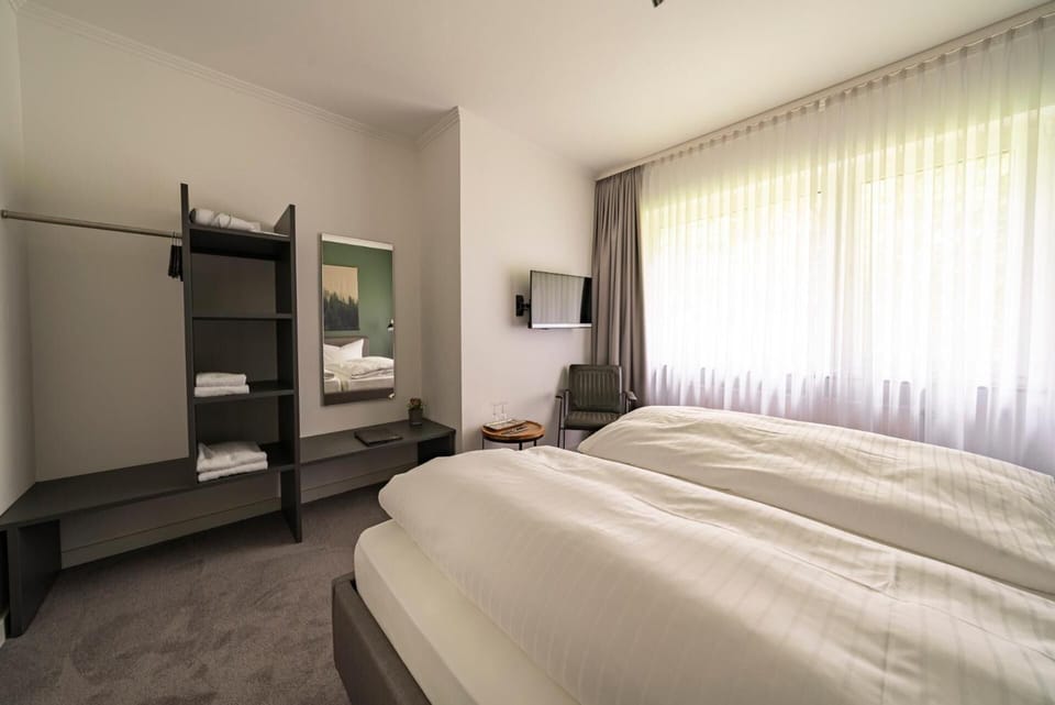 Desk, blackout drapes, free WiFi, bed sheets