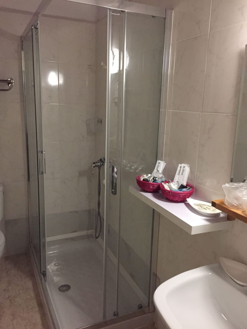 Shower, free toiletries, hair dryer, slippers