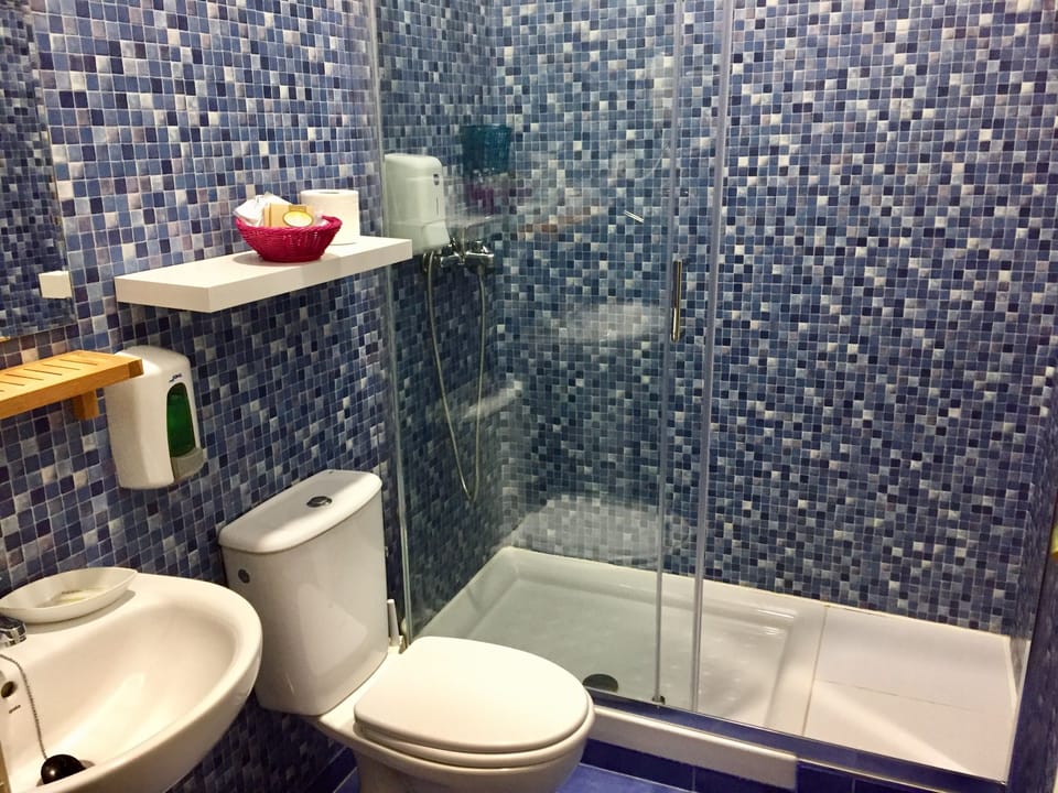 Standard Double Room | Bathroom | Shower, free toiletries, hair dryer, slippers