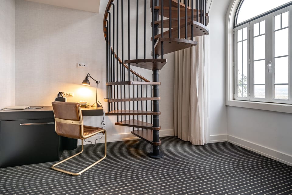 Duplex | Minibar, in-room safe, desk, blackout drapes