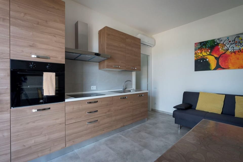 Superior Apartment, 1 Bedroom, Patio, Garden View | Private kitchen | Microwave, coffee/tea maker, cleaning supplies