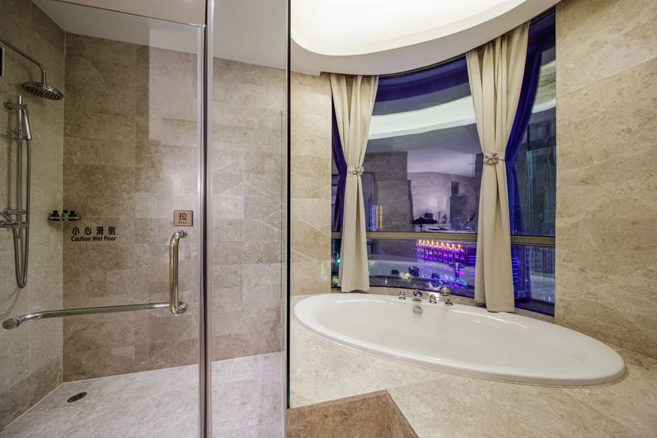 Combined shower/tub, free toiletries, hair dryer, bathrobes