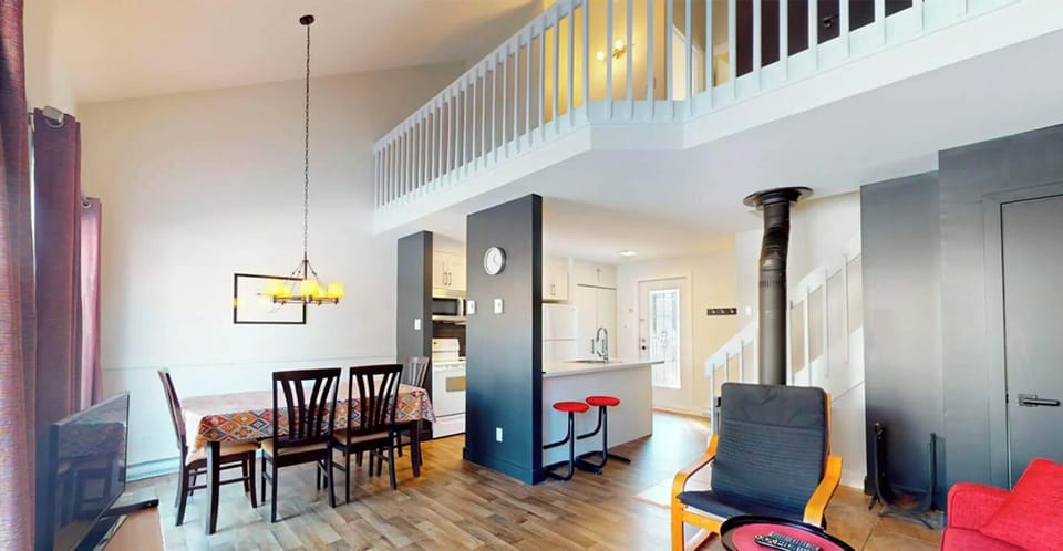 Condo, 2 Bedrooms, Mezzanine (1 km from slopes) | Living area | 32-inch TV with cable channels