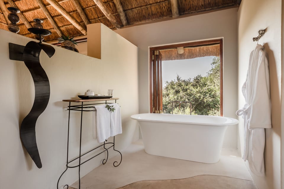 Rainfall showerhead, free toiletries, hair dryer, slippers