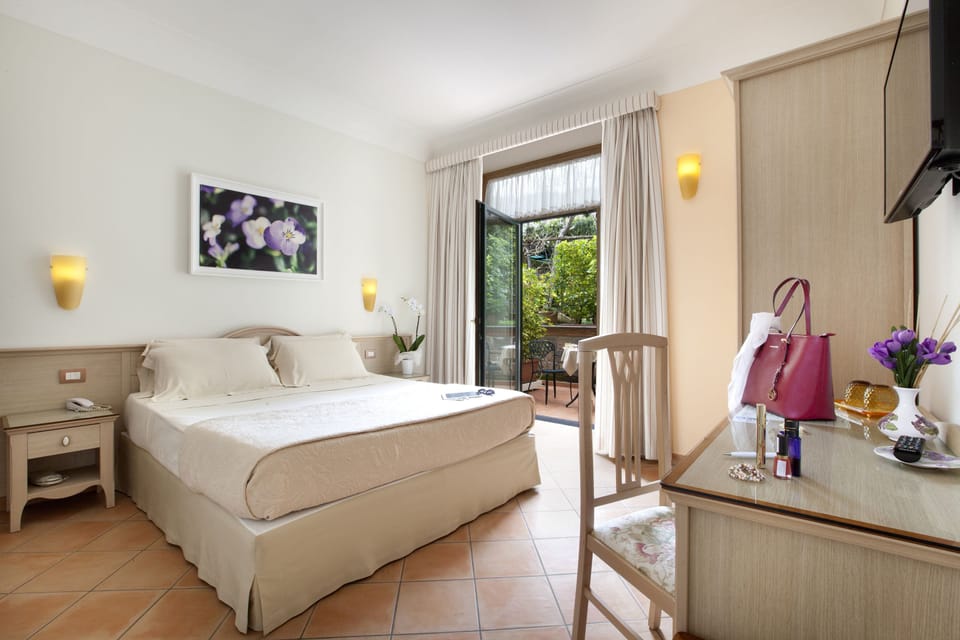 Down comforters, memory foam beds, minibar, in-room safe