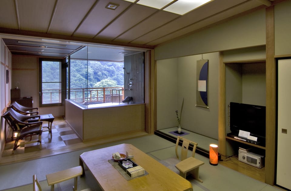 Japanese Style Room with Open-air bath, Non-smoking | Living area | Flat-screen TV