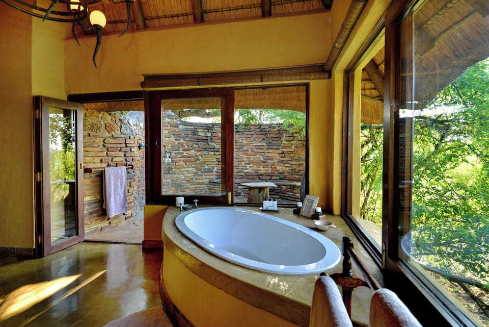 Separate tub and shower, deep soaking tub, hair dryer, bathrobes