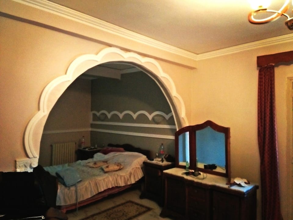 Family Suite, Multiple Beds, Private Bathroom | Individually decorated, blackout drapes, free WiFi, bed sheets