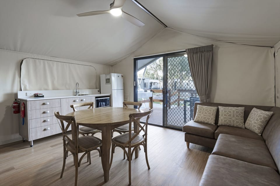 Deluxe Safari Tent - Sleeps 4 | Living area | TV