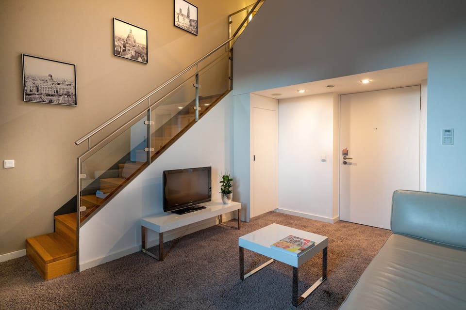 Minibar, desk, blackout drapes, iron/ironing board
