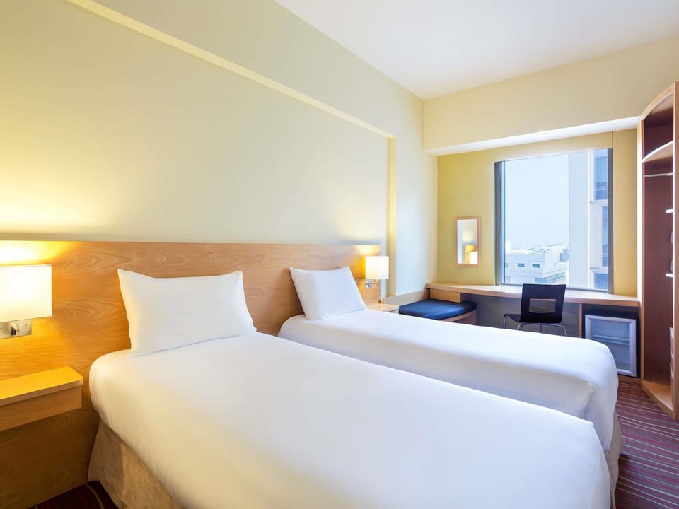 Standard Room, 2 Twin Beds | In-room safe, desk, soundproofing, iron/ironing board