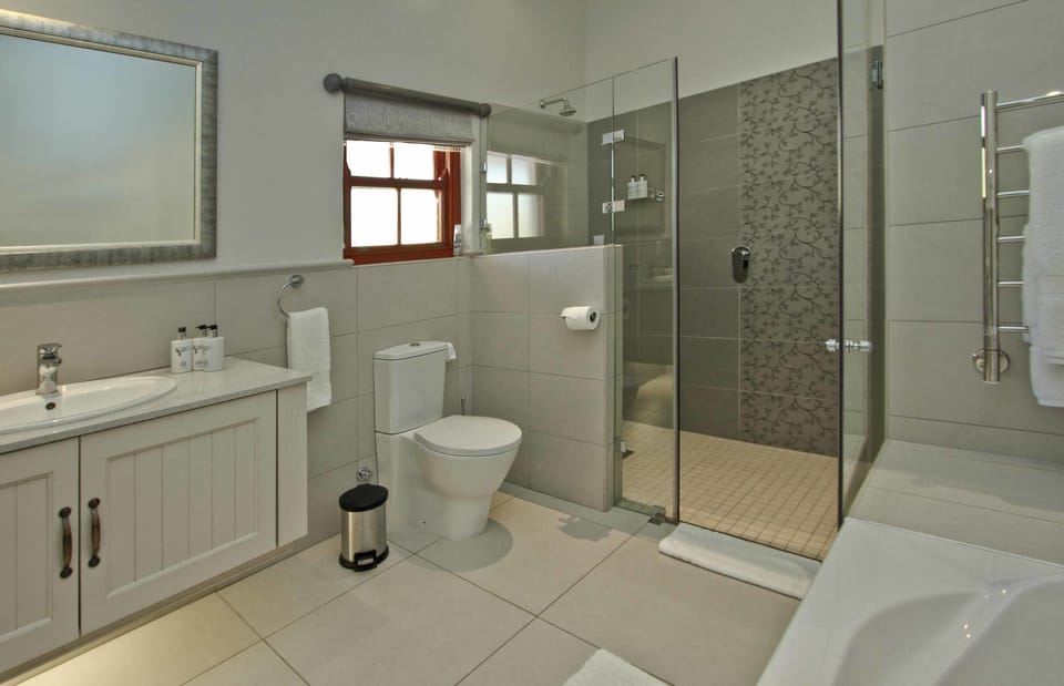 Designer toiletries, hair dryer, bathrobes, towels