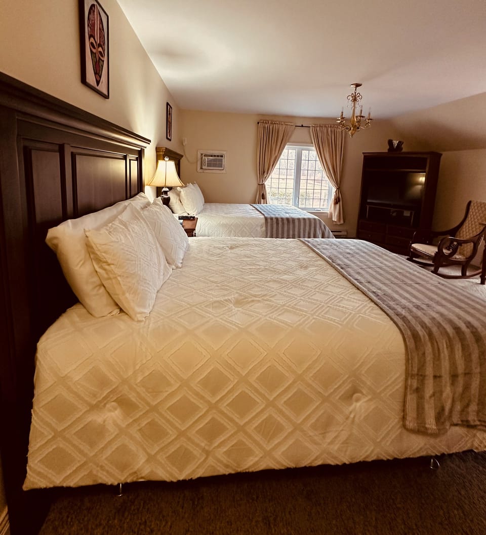 Room 6 Double Queen | Premium bedding, down comforters, Tempur-Pedic beds