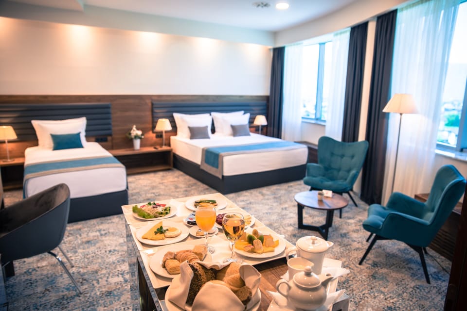 Premium Triple Room | Select Comfort beds, minibar, in-room safe, desk