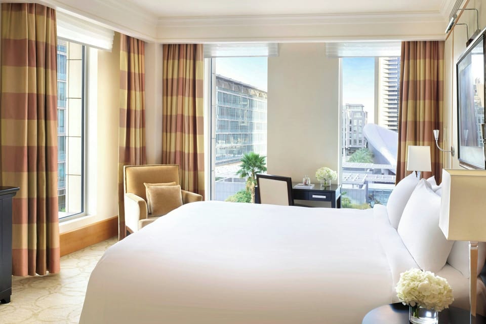 Frette Italian sheets, premium bedding, down comforters, minibar