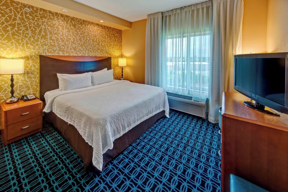 Premium bedding, pillowtop beds, desk, laptop workspace