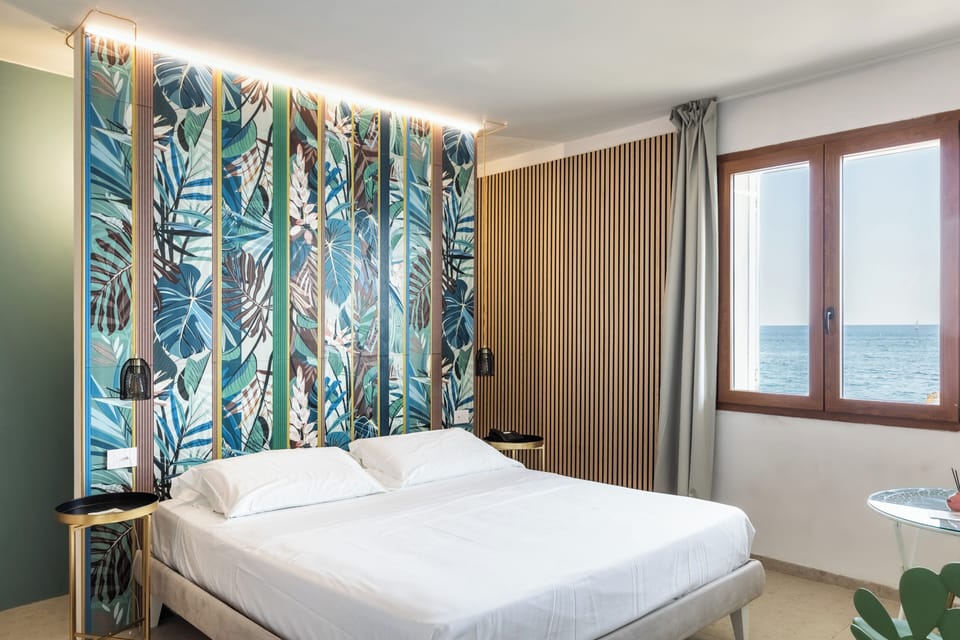 Romantic Double Room, 1 Queen Bed, Sea View, Sea Facing | Hypo-allergenic bedding, minibar, in-room safe, individually decorated