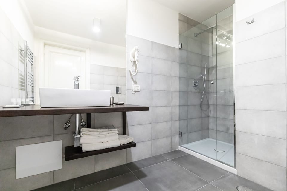 Shower, free toiletries, hair dryer, bathrobes