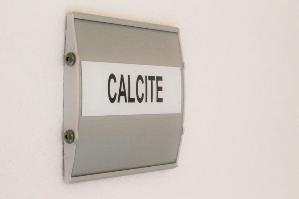 Economy Quadruple Room, Shared Bathroom (Calcite) | Desk, cribs (free), rollaway beds (surcharge), bed sheets