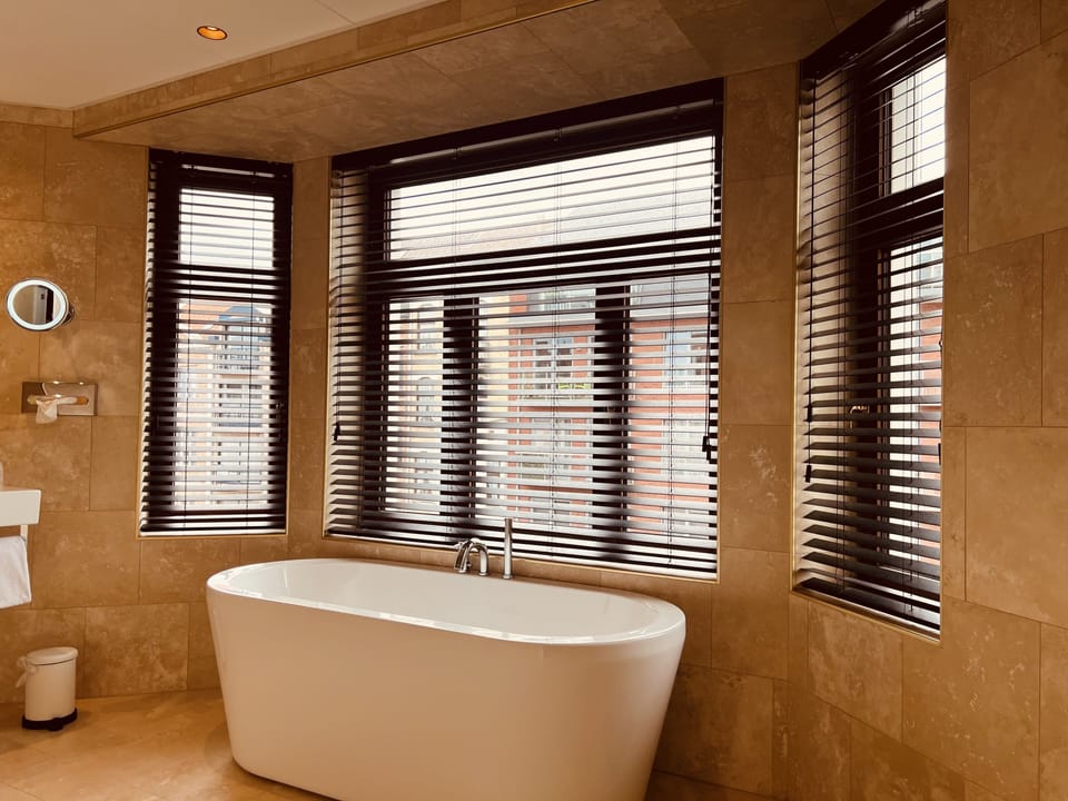 Combined shower/tub, deep soaking tub, rainfall showerhead