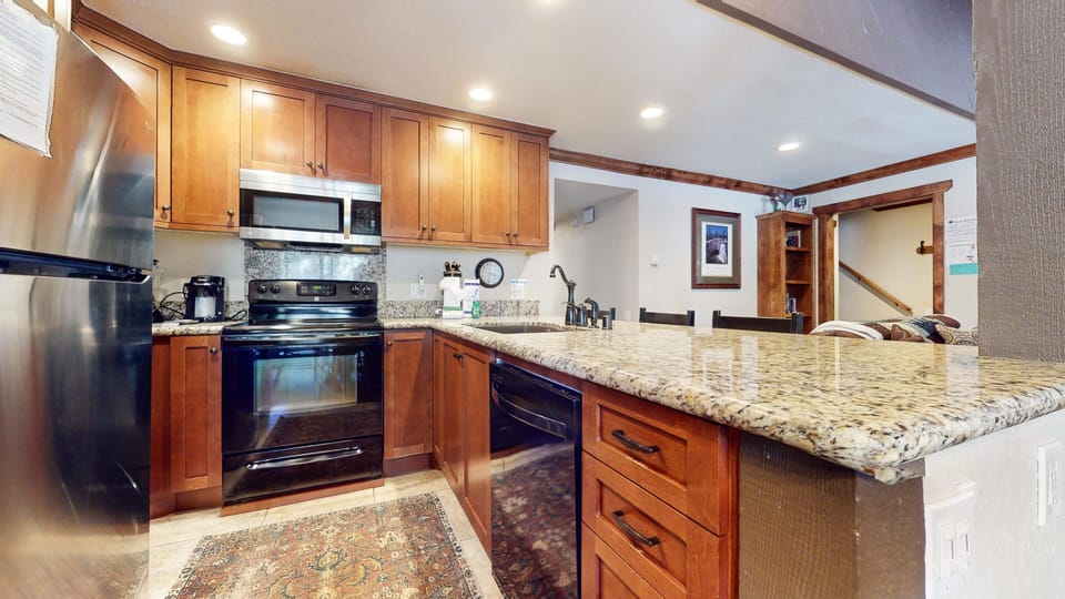 Condo, 2 Bedrooms | Private kitchen | Fridge, microwave, oven, dishwasher