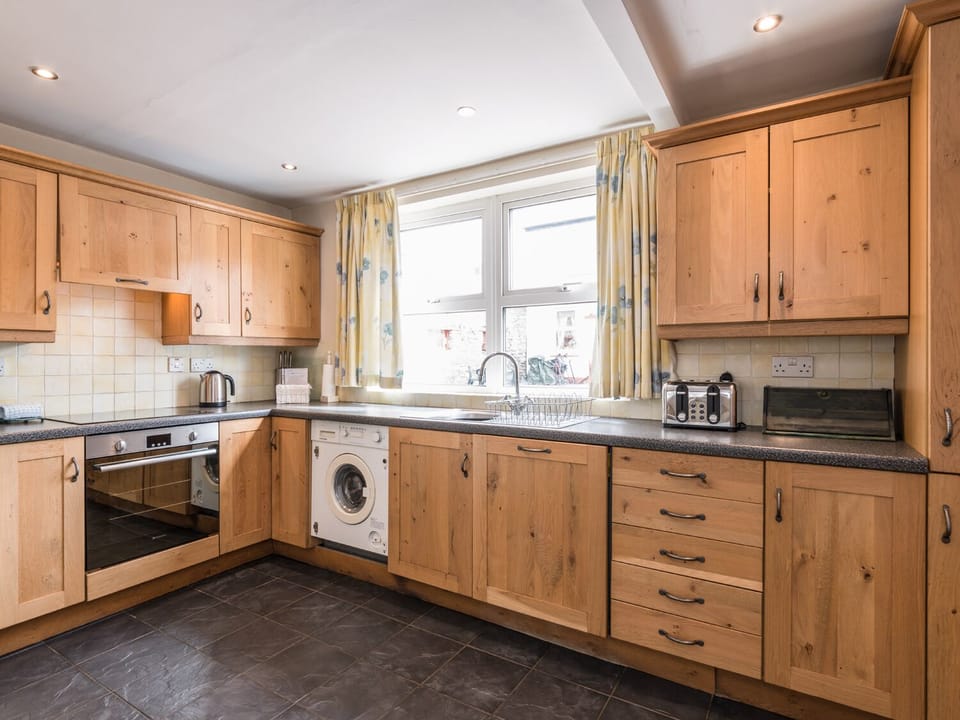 Cottage | Private kitchen | Stovetop, dishwasher, highchair, cookware/dishes/utensils