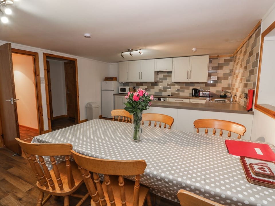 Cottage | Private kitchen | Fridge, microwave, stovetop, highchair