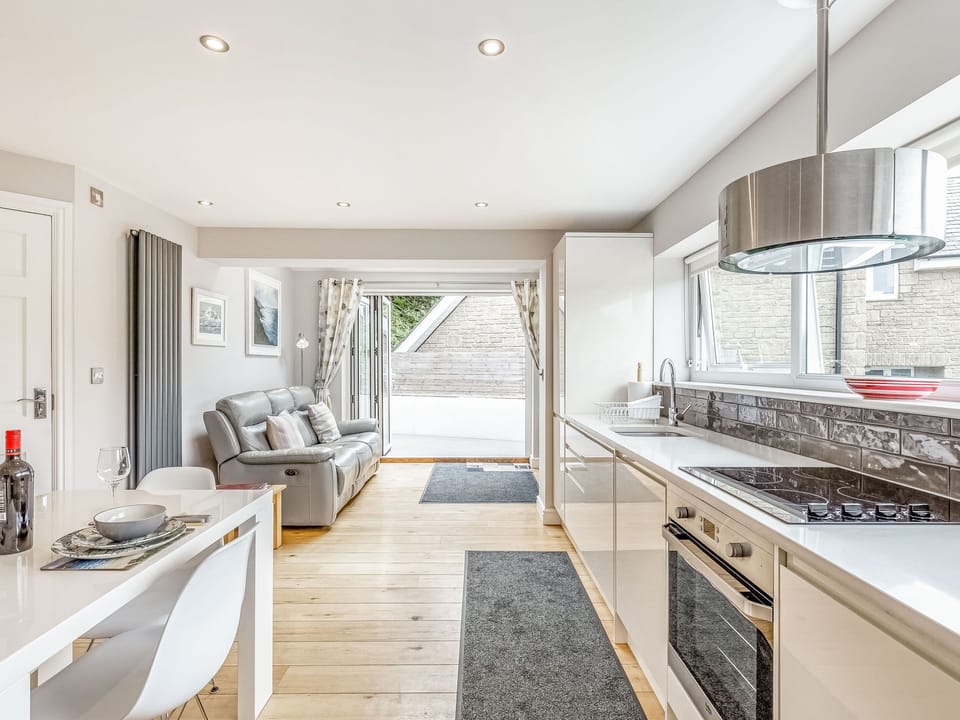 Cottage | Private kitchen | Fridge, microwave, stovetop, dishwasher
