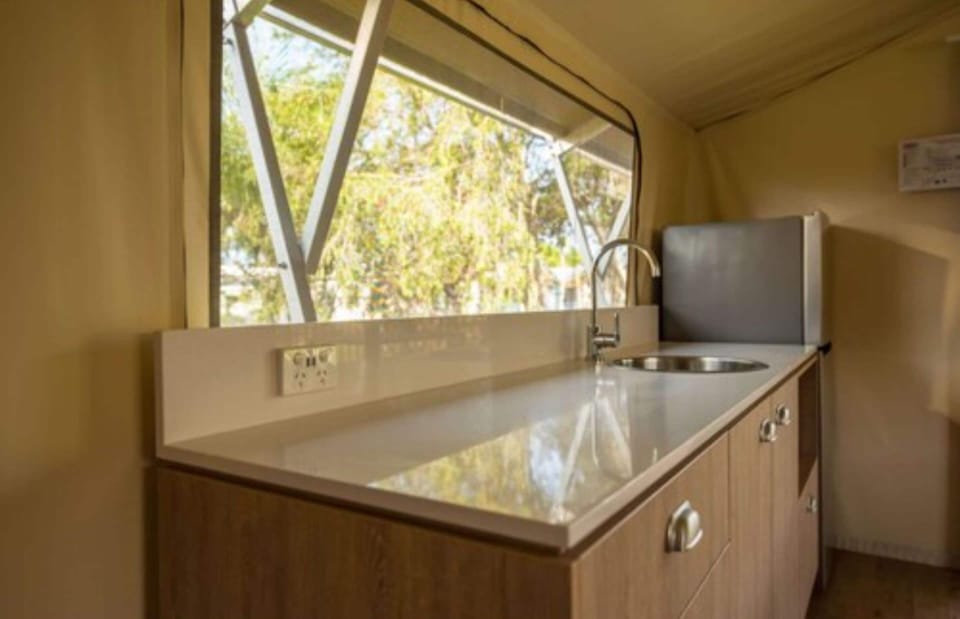 Deluxe Safari Tent | Private kitchen | Fridge, stovetop, electric kettle, cookware/dishes/utensils