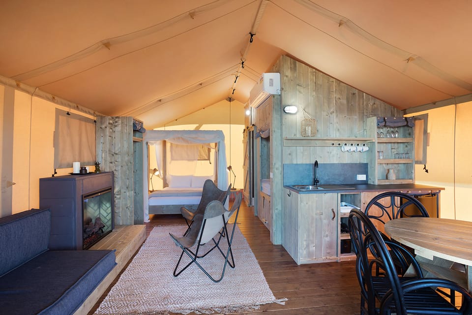 Safari Tent | Living area | 42-inch flat-screen TV with satellite channels
