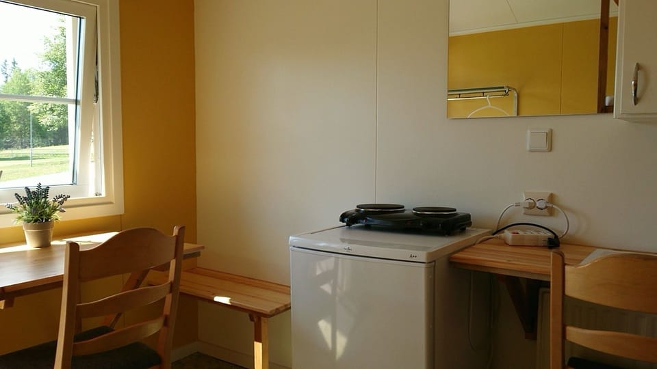 Cabin, Refrigerator | 1 bedroom, down comforters, blackout drapes, WiFi (free)