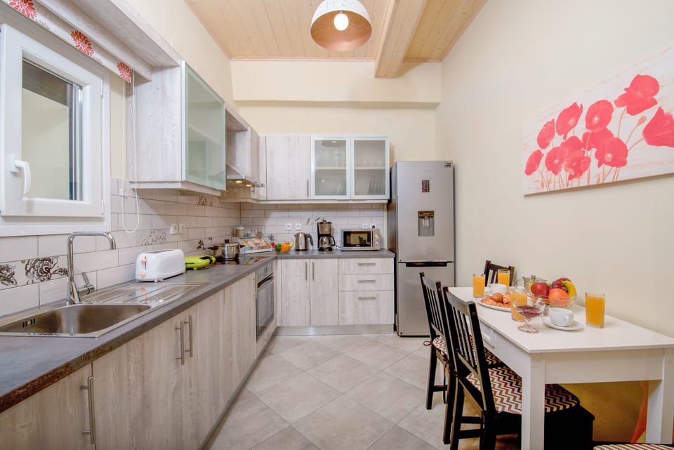 Apartment, 2 Bedrooms, Sea View | Private kitchen | Fridge, microwave, oven, stovetop