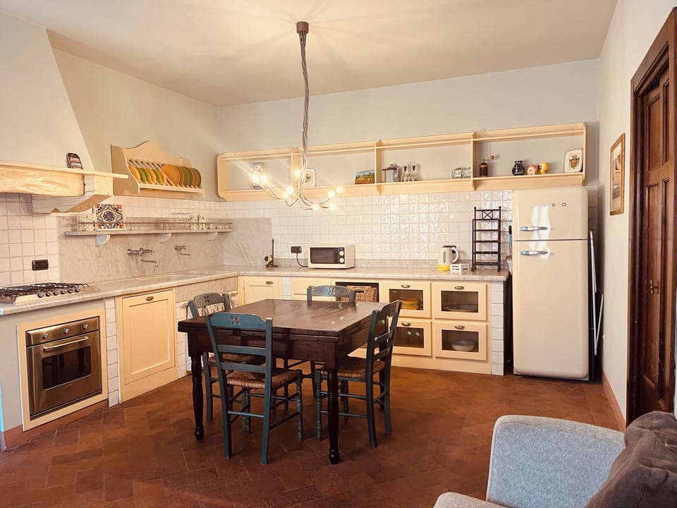 Deluxe Apartment, 2 Bedrooms, 2 Bathrooms, Garden View | Private kitchen | Highchair