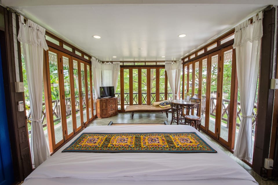 Double Room, River View | Free minibar items, individually decorated, individually furnished, desk