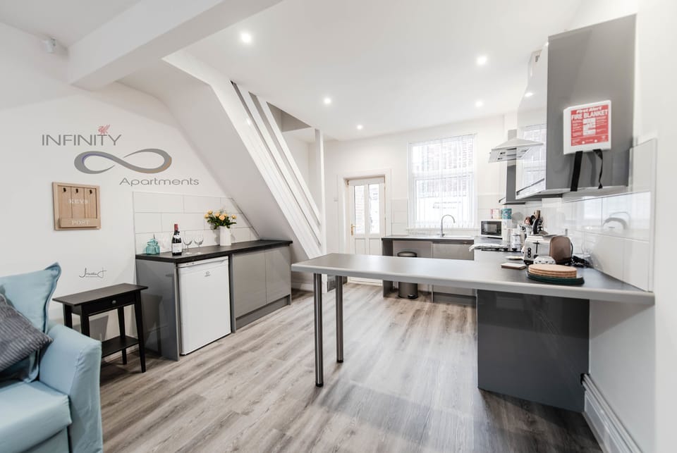 Premium Townhome, Multiple Beds, Non Smoking | Private kitchen | Full-size fridge, microwave, oven, stovetop